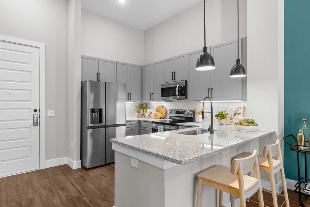 District at 54; Studio, One and Two Bedroom Apartment Homes in the vibrant community of Trinity Park and minutes from downtown Raleigh, NC; Pet-friendly luxury apartment community.